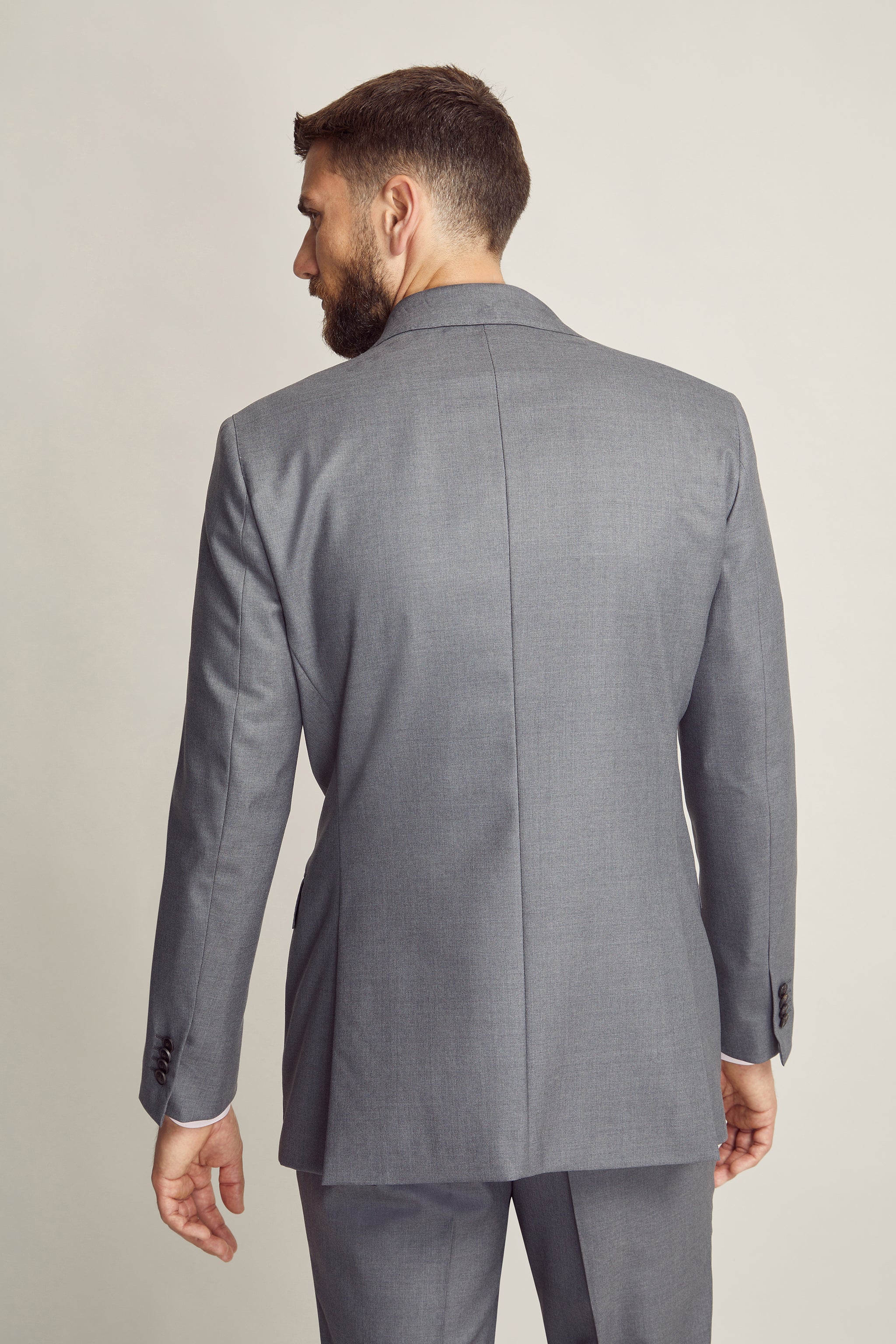 Luxury Grey Suit custom tailored in Sydney Australia, back view.