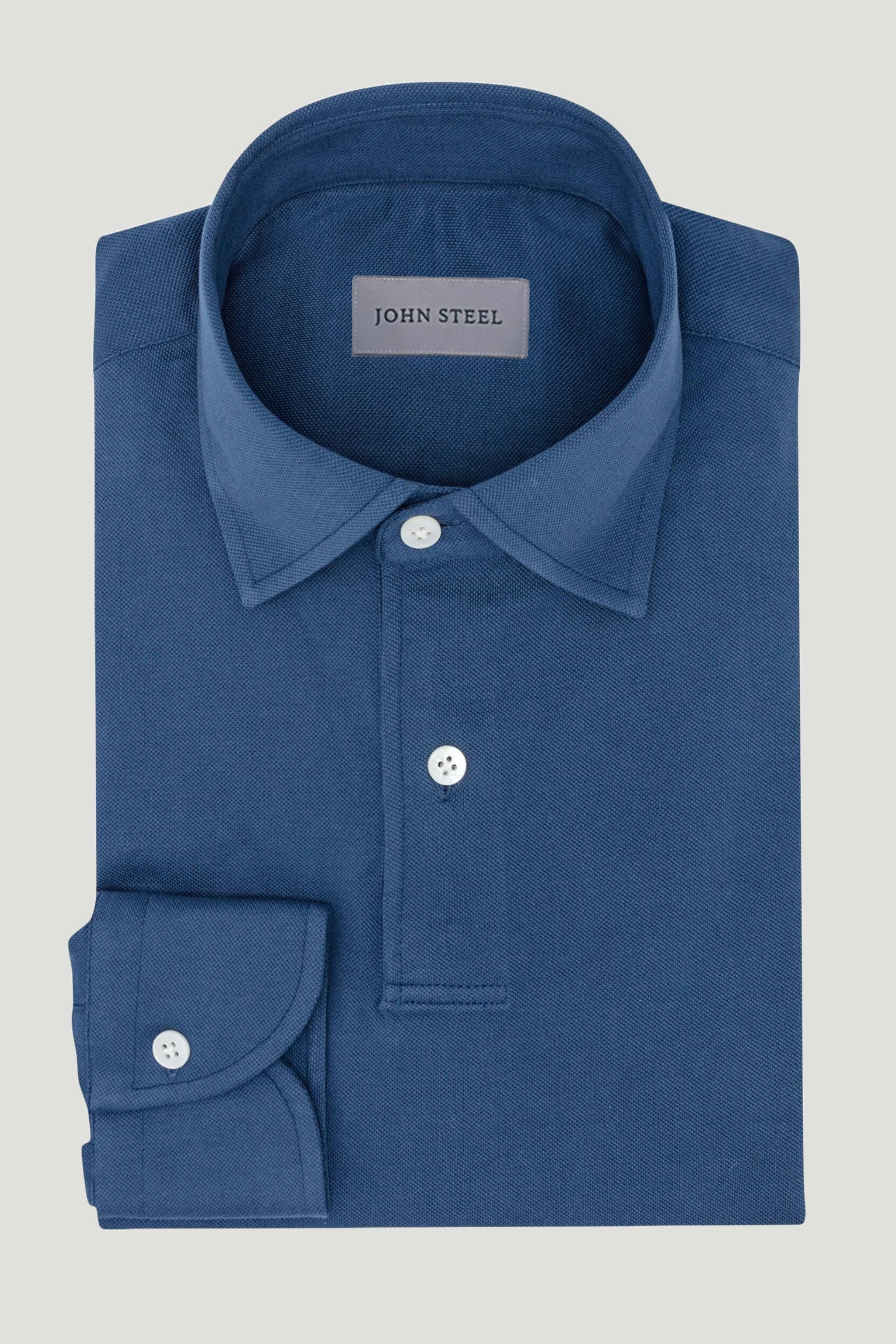 Medium Blue Pique Polo Shirt custom tailored in Sydney Australia.